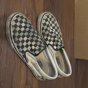 Worn slip on checkered vans